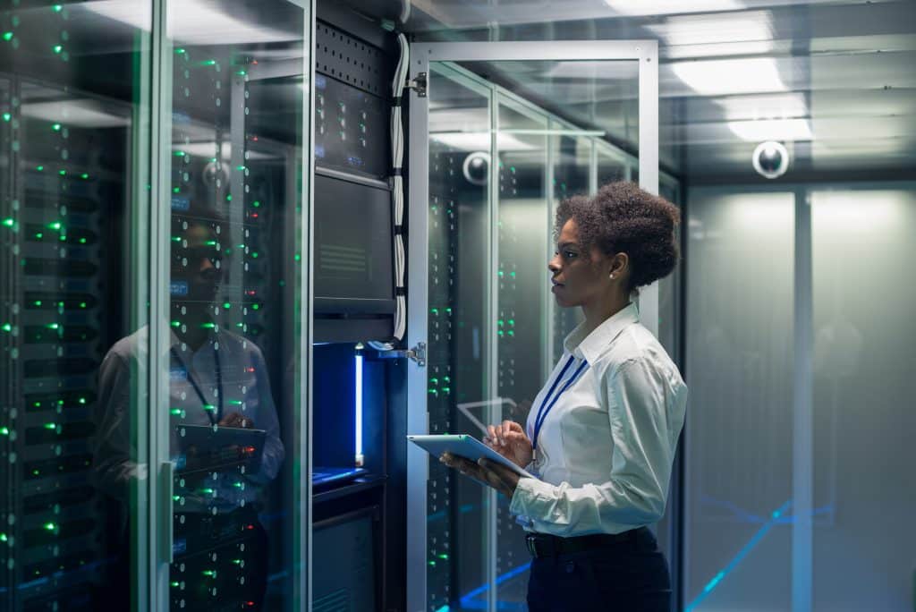 Female technician setting up VPS cloud Hosting